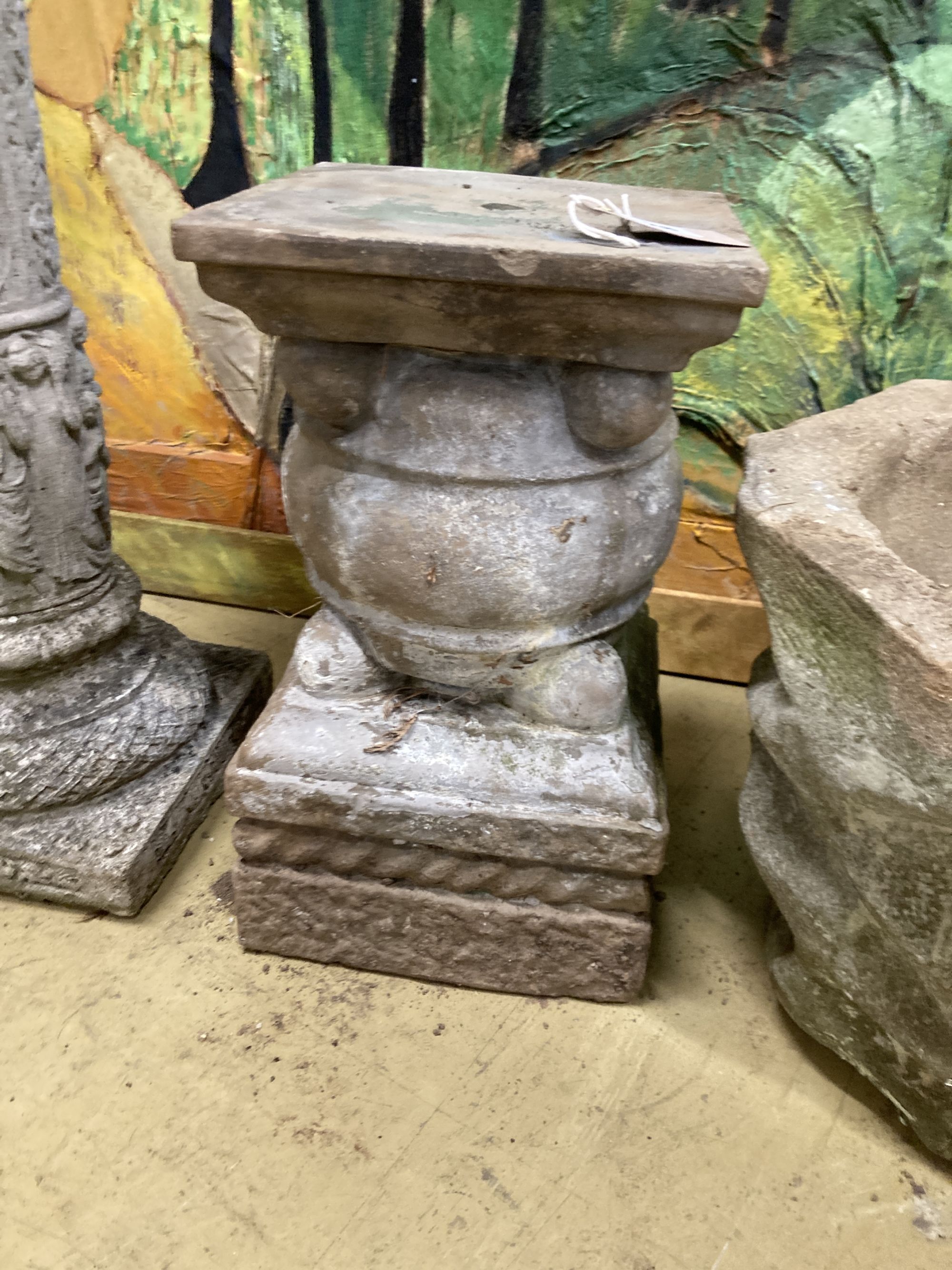 A reconstituted stone garden bird bath, 40cm diameter, height 78cm, a planter and a plinth